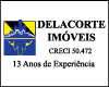 DELACORTE IMOVEIS logo